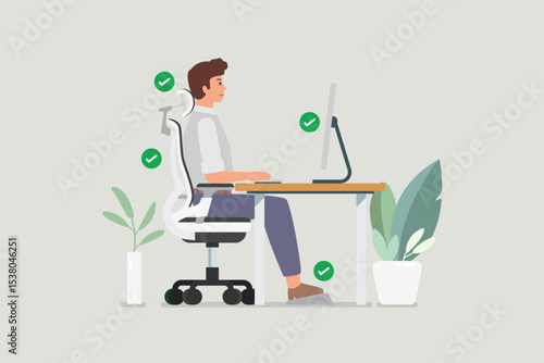 Man sitting properly at desk and working with a computer