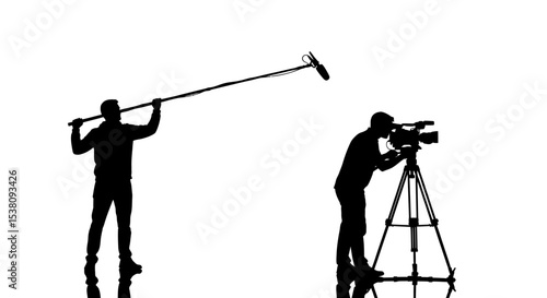 Silhouette of Filmmakers Capturing Footage with Camera and Microphone