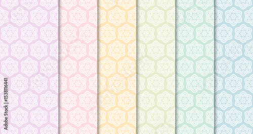 A collection of geometric patterns which combines geometric shapes with floral motifs in pastel colors. Can be used for wallpaper, textiles, or other decorative applications. 