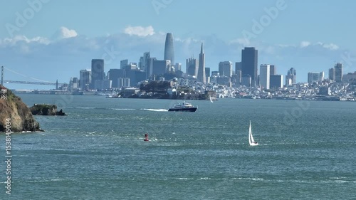 San Francisco Bay Ferry and Alcatraz with San Francisco City Skyline Background