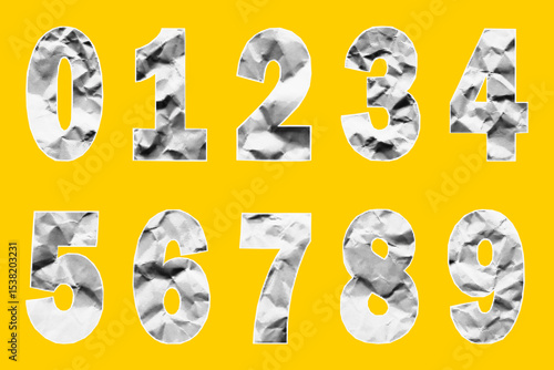 Set of numbers with crumpled paper texture. Jagged torn edges, gritty stipple halftone effect, collage ransom note style. Retro cutout digits from old notebook pages.