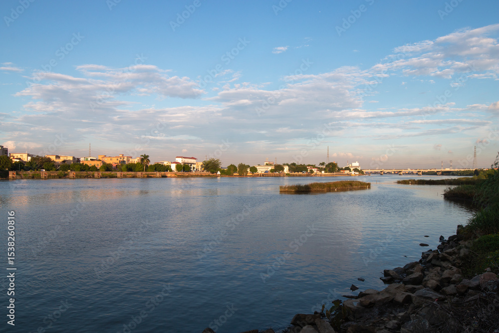 Fototapeta premium sunset over the river