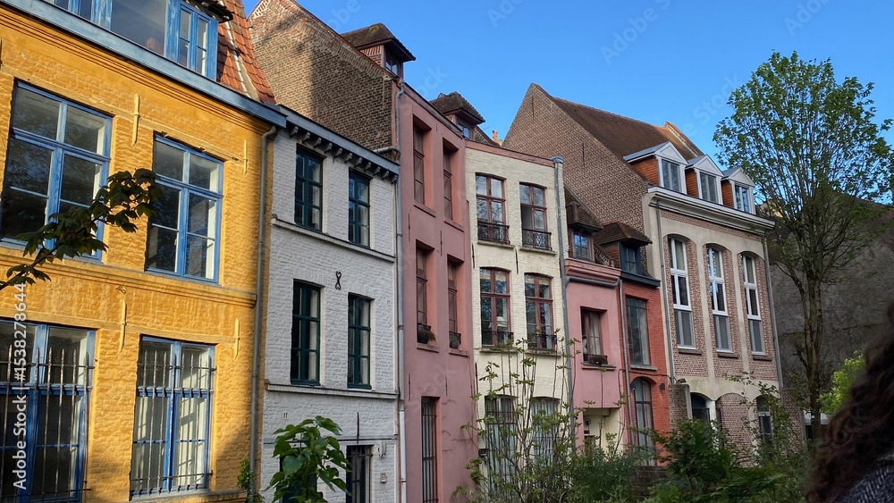 Naklejka premium old houses in Lille, colourful buildings and an amazing blue sky 