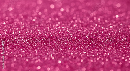 Close-up shot of sparkling pink glitter background with bokeh effect for festive designs