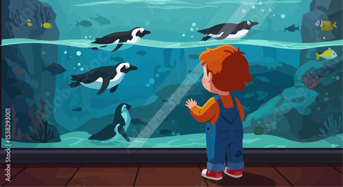 Little boy watching penguins swimming in aquarium glass  