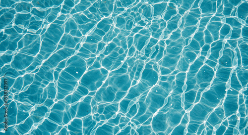 Abstract image of water surface texture with caustics reflections and ripples in the sunlight