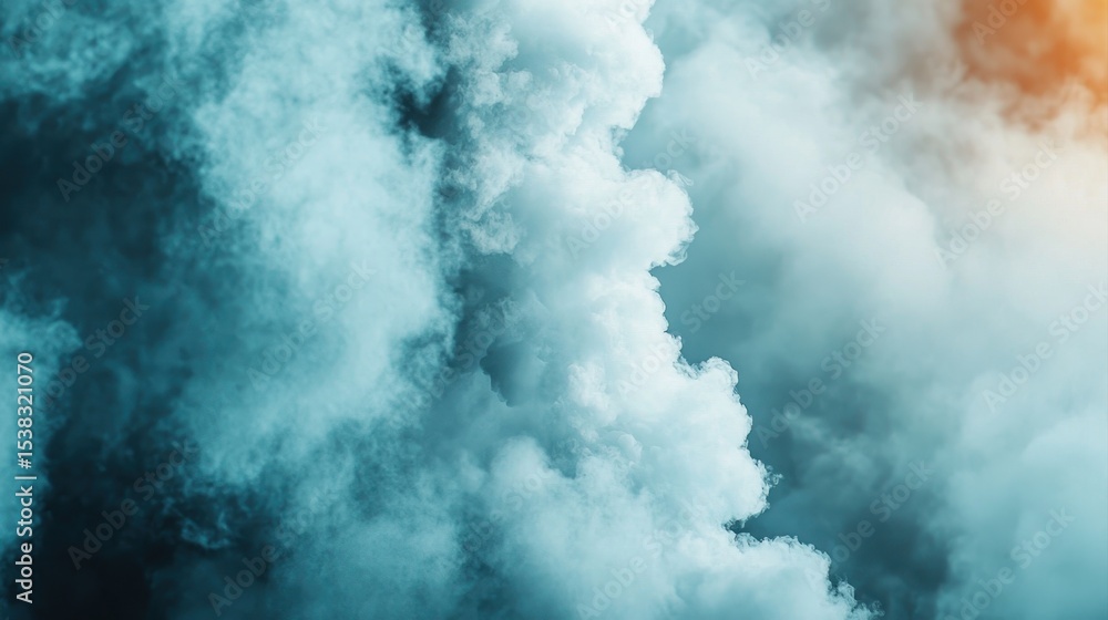 Fototapeta premium Thick, colorful clouds of smoke blend together, creating a dramatic and atmospheric effect with a hint of orange light.