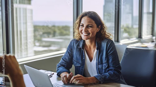 Woman smiling in a job interview with HR manager in modern office, performance review open communication in company, generative