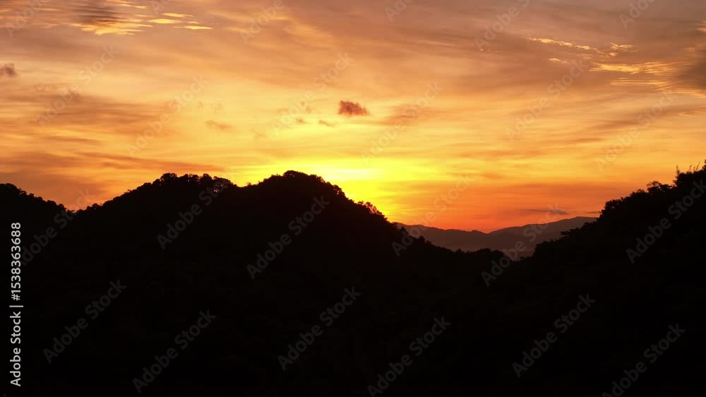 breathtaking sunset over the ocean, painting the sky in vibrant orange, red, and purple hues above the silhouette of coastal buildings and anchored ships. Peaceful and cinematic breathtaking sunset over the ocean, painting the sky in vibrant orange, red, and purple hues above the silhouette of coastal buildings and anchored ships. Peaceful and cinematic