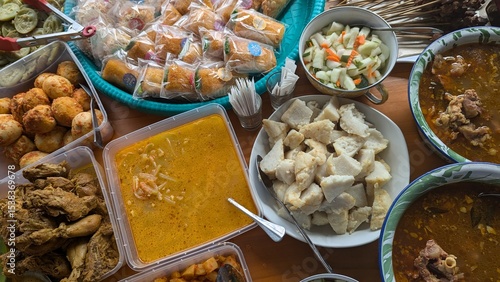 Traditional Eid al-Fitr Dishes: Ketupat Rice Cakes, Vegetable Curry, and Fried Risoles