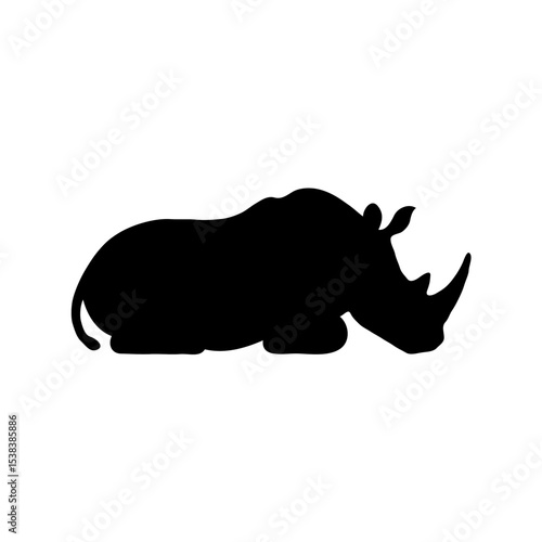 Grace in Stillness: A Minimalistic Black and White Silhouette of a Rhinoceros in the Heart of Nature