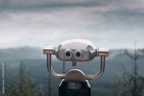 Obraz na plátne Coin operated binoculars on top of the mountain