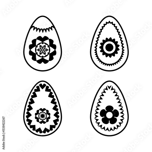 Set of 4 black decorative egg shapes with geometric and floral patterns isolated on white background. Ethnic collection of Easter design elements.