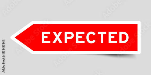 Red color arrow shape sticker label with word expected on gray background