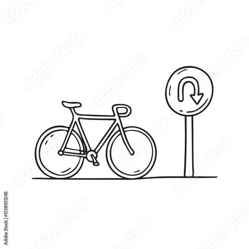 A bicycle nearing a U turn arrow painted on the road