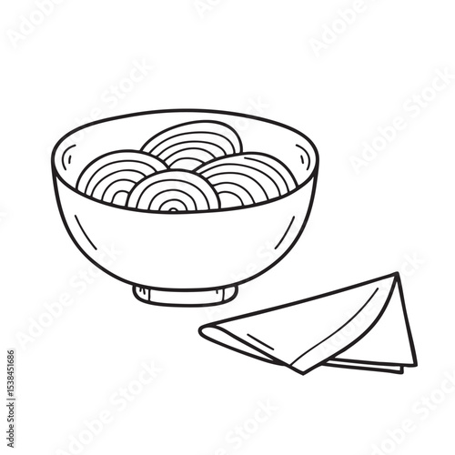 A bowl of udon noodles beside a neatly folded napkin