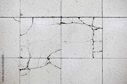 Cracked Concrete Surface Texture Background © Akrapong