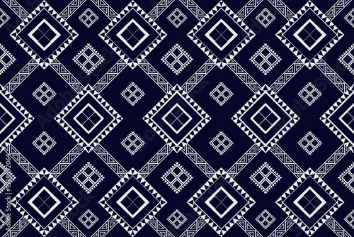 A seamless indigo geometric ethnic pattern inspired by traditional tribal textiles. Perfect for fashion design, fabric printing, home decor, or digital backgrounds. Ideal for use on clothing, scarves,