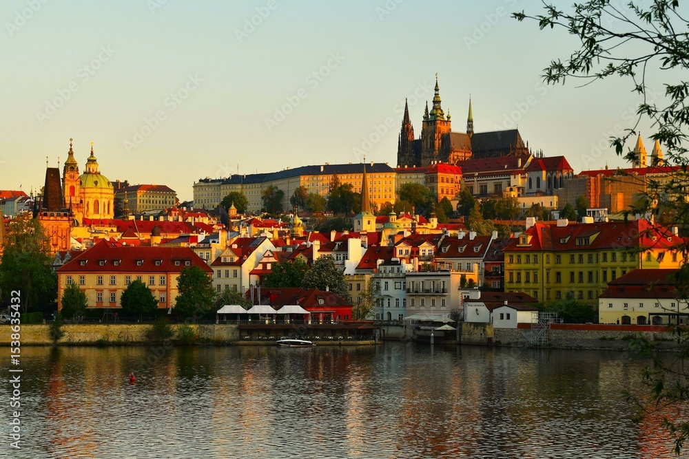 Fototapeta premium Prague Castle (Czech: Pražský hrad) at the crack of dawn - an ancient castle complex in Prague serving as the official residence and workplace of the president (Czech Republic)