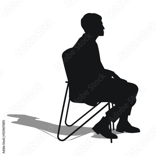 Profile of a man, sitting on a soft chair, listening, black silhouette