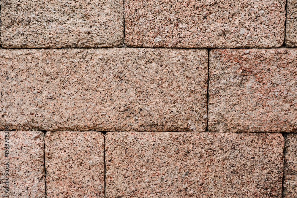 Fototapeta premium stone wall natural textured, brick shape stones constuction surface background