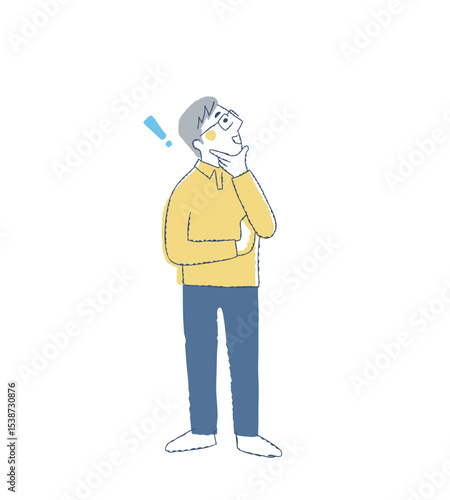 顎に手を当てて上の方を見ている笑顔の男性