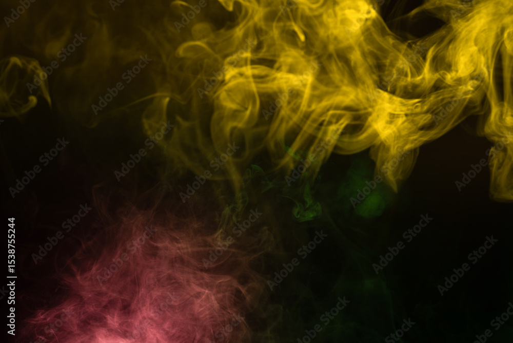 Obraz premium Green and pink steam on a black background.