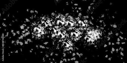 Snowflakes on dark background. white icy snowflakes isolated on black background, natural background. white crystalline powder on a black background. sugar dust. texture, pattern and clipping.