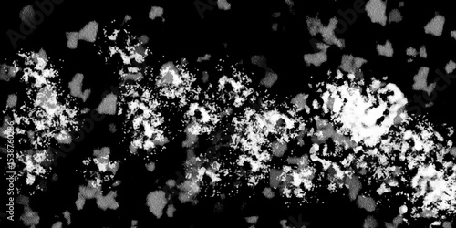 Snowflakes on dark background. white icy snowflakes isolated on black background, natural background. white crystalline powder on a black background. sugar dust. texture, pattern and clipping.