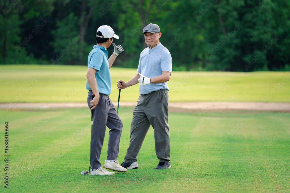 Obraz premium Good shot buddy. Shot of two happy men playing a game of golf. Golf, friends and sport with men on course playing