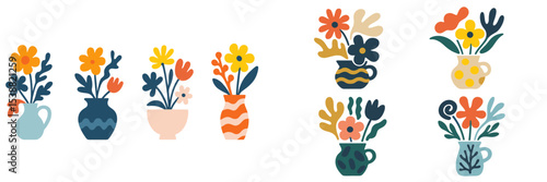 Colorful floral arrangements in various vases displayed on a neutral background during the day