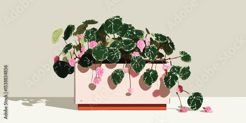 A beautiful indoor plant potted in a designer container radiates freshness, the lush green leaves and delicate pink flowers offering a serene touch to any interior space.