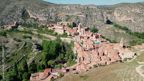 Albarracín ialongside the Guadalaviar River in Spain. A 10 second aerial view of this ancient, beautiful spanish town