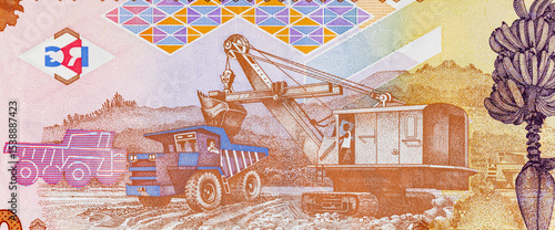 1000 Guinean Francs with the image of Bauxite mining by open pit method. African Guinean money close-up