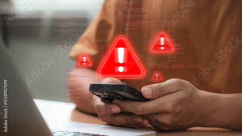 Фотография Cybersecurity threat warning on smartphone with red alert icon signaling hacking