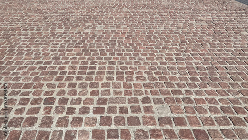 Naklejka Old cobblestone pavement close-up