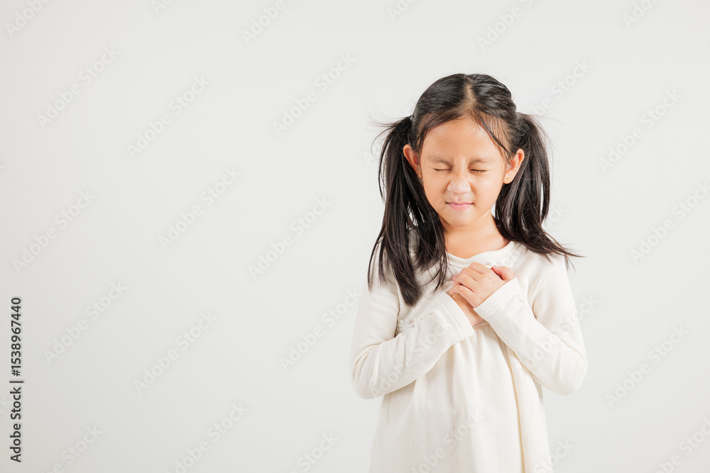 Young kid girl pressing on chest pain isolated on white background, painful expression heartache, kindergarten children having heart attack heart disease, Painful cramps problem Young kid girl pressing on chest pain isolated on white background, painful expression heartache, kindergarten children having heart attack heart disease, Painful cramps problem