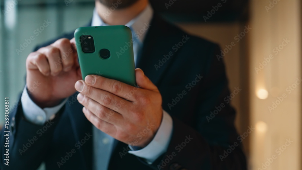 Entrepreneur hands touching mobile phone walking business center hallway closeup Entrepreneur hands touching mobile phone walking business center hallway closeup