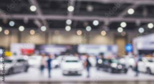 Wallpaper Mural Immersive Blurred View of a Vibrant Car Show Exploring the Excitement of New Models, Crowds, and the Automotive Industry's Latest Innovations Torontodigital.ca