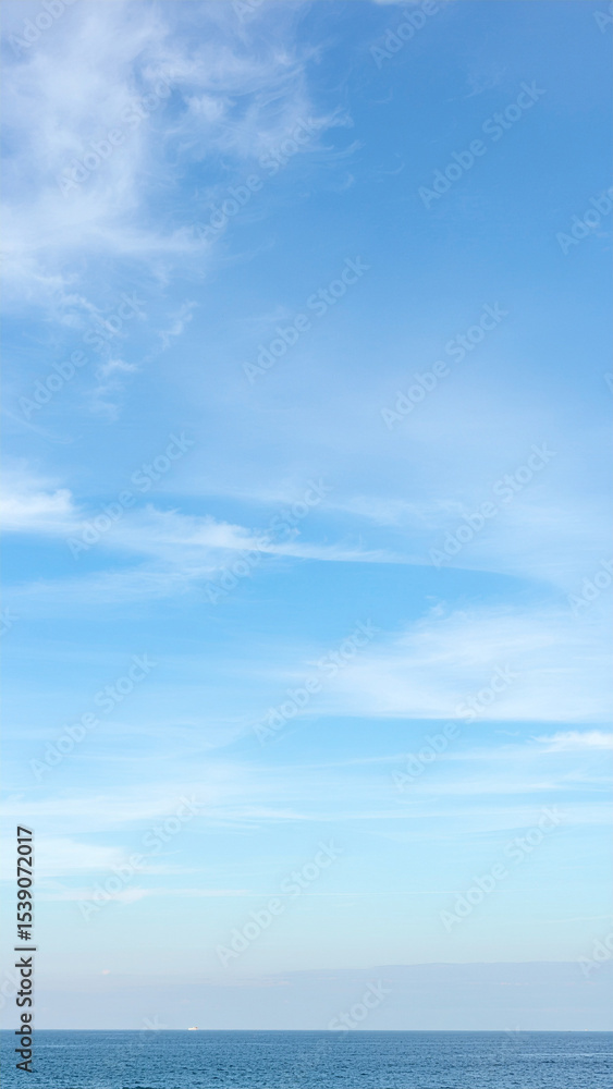 Obraz premium Fantastic soft white clouds against blue sky background.