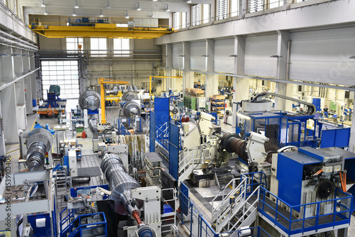 Fotografie assembling and constructing gas turbines in a modern industrial factory