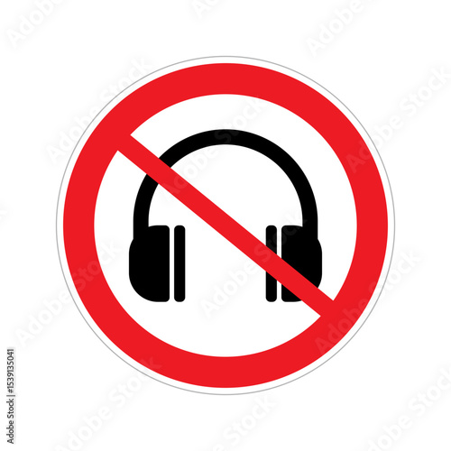 A circular sign features a red prohibition symbol over a black headphone icon, indicating no headphones allowed. This promotes a quiet environment for studying or reading