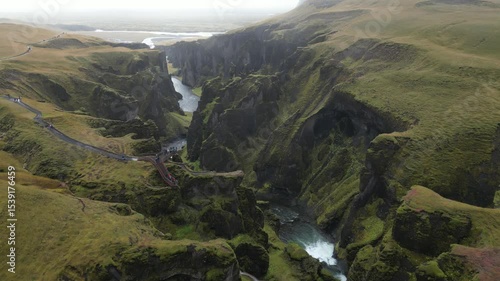 Fjadrargljufur Canyon Drone Footage with Clouds and Cliffs