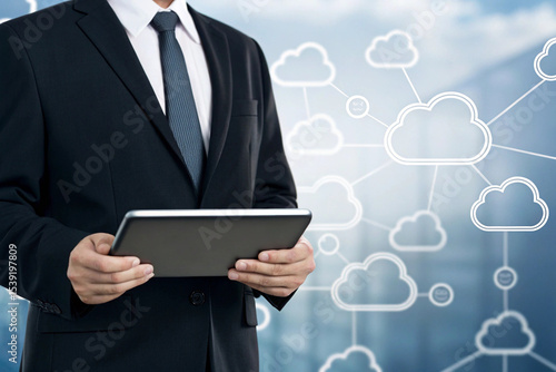 Wallpaper Mural Businessman Using Tablet with Cloud Computing Network Background Torontodigital.ca