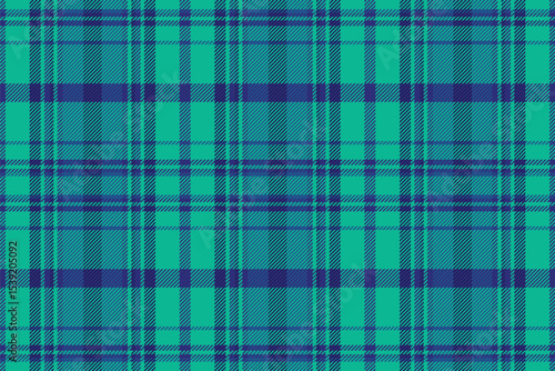 Vibrant teal and navy plaid pattern. Perfect for textile design, fashion, website backgrounds, or scrapbooking projects.  This seamless texture evokes a sense of classic style with a modern twist.
