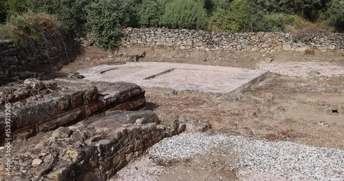 Roman ruins of Caparra with tower remains and ancient city gate.
