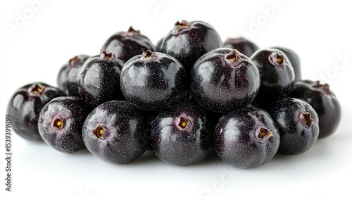 Close-up of a pile of dark purple berries.