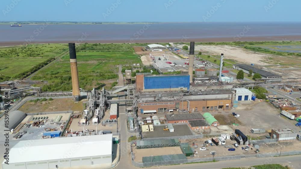 Aerial drone shot Industrial factory Humber Energy Park building manufacturing processing storage tanks of industrial facility near Immingham England UK Aerial drone shot Industrial factory Humber Energy Park building manufacturing processing storage tanks of industrial facility near Immingham England UK
