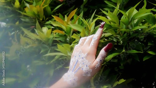 4K slow-motion video of an artistic hand interacting with plant life – ideal for eco, wellness, and creative visual themes
