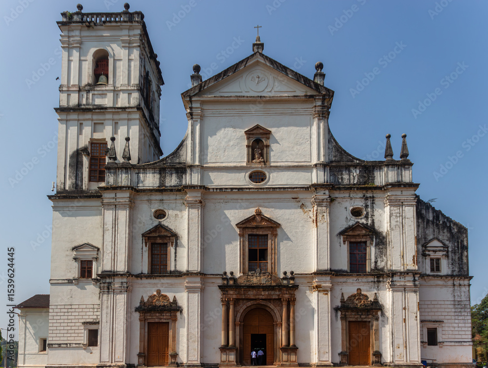 Fototapeta premium Se Cathedral Goa's majestic white facade under sunlight